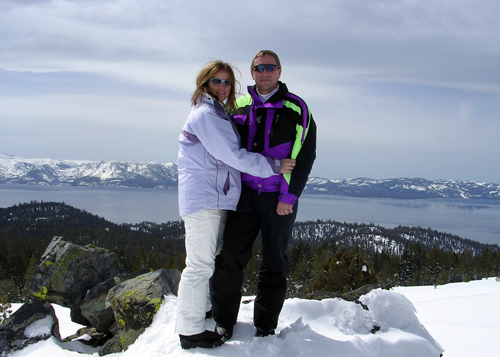 Stop during snowmobile tour for picture of us and Lake Tahoe.