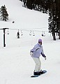 Edie snowboarding